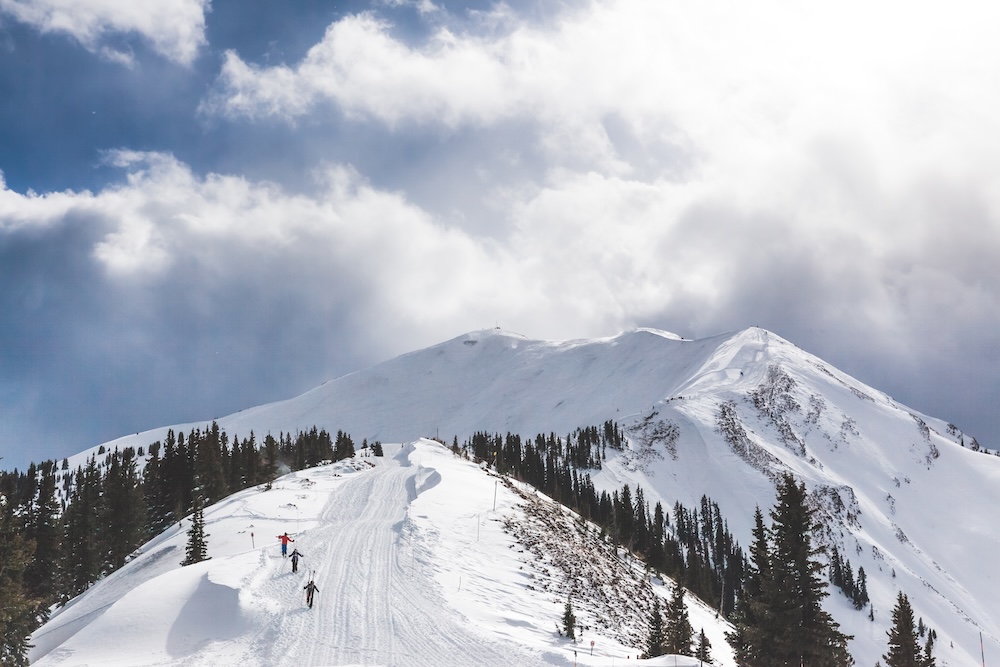 Family skiing the Aspen Highlands bowl